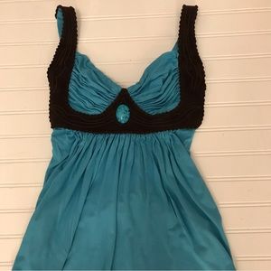 Sky bustier style top with turquoise stone and black suede detail
